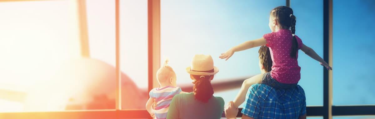 Family at the airport ready for their flight