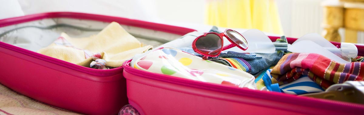 suitcase packed with clothes